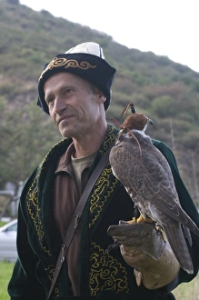 Falconer with a falcon, Sunkar Eagle Farm, Kazakhstan, Central Asia, Asia