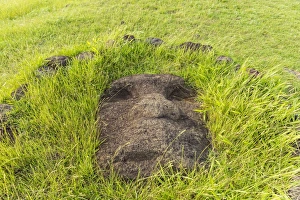 Fallen moai head at the archaeological site at Ahu Vinapu, Rapa Nui National Park, UNESCO World Heritage Site, Easter Island (Isla de Pascua), Chile, South America
