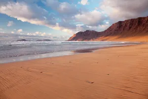 Vanishing Point Gallery: Famara Beach and Famara Mountains at sunset, view to La Graciosa Island, Lanzarote