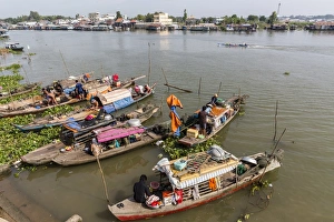 Subsistence Prints: Families in their river boats at the local market in Chau Doc, Mekong River Delta