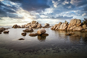Seashore Prints: Famous Palombaggia beach with rocks at sunset, Island of Corsica, France