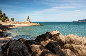 Tasman Prints: Famous Rock Tower on Rocky Shoreline Overlooking Turquoise Sea at Abel Tasman National Park