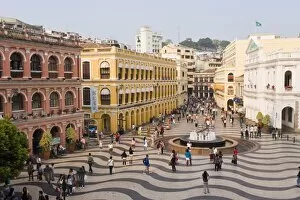 Images Dated 29th October 2007: The famous swirling black and white pavements of Largo do Senado square in central Macau