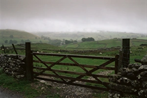 Overcast Skies Prints: Farm gate and overcast skies near Malham, Yorkshire Dales National Park