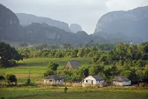 Images Dated 9th May 2010: Farm houses and mountains, Vinales Valley, UNESCO World Heritage Site, Cuba
