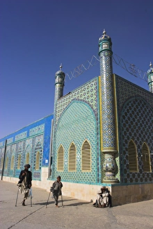 40 45 Years Prints: Father and son amputees outside the Shrine of Hazrat Ali, who was assassinated in 661