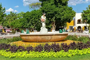 Female Mayan figure woman holding water jug in fountain, Francisco Canton Rosado Park, Vallodolid, Yucatan, Mexico, North America