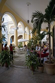 Female reed trio playing to diners at the Santo Angel restaurant, Plaza Vieja