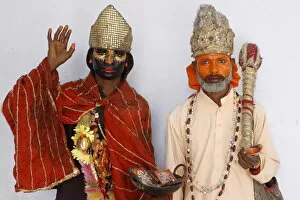 Images Dated 9th April 2010: Female sadhu (sadhvia) impersonating goddess Kali and male sadhu impersonating god