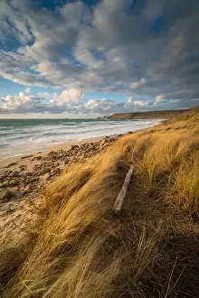 Sennen Prints: Fence post in foreground, with Brissons and Cape Cornwall in the far distance, Sennen