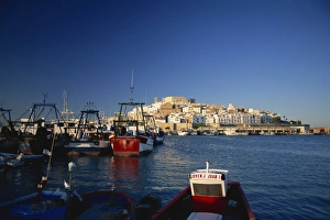 Peniscola Prints: Ferries in the harbour at dusk