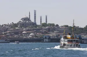 Ferry boat on Bosphorus with the Suleymaniye Mosque in the distance, Istanbul Ferry boat on Bosphorus with the Suleymaniye Mosque in the distance, Istanbul