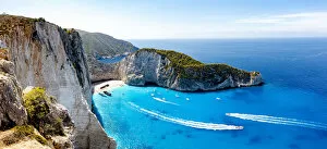 Lagoon Gallery: Ferry boats in the turquoise lagoon surrounding the iconic Shipwreck Beach (Navagio Beach)