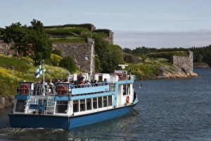 Images Dated 12th June 2009: Ferry to Helsinki, with historic Fortress walls in the background, UNESCO World Heritage Site