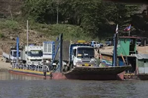 Ferry from Thailand crossing the Mekong River towards Laos, Southeast Asia, Asia