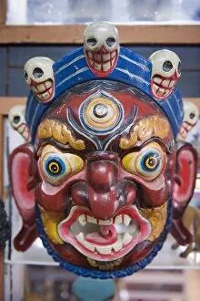 Images Dated 4th October 2009: Festival mask in a souvenir shop, Bhutan, Asia