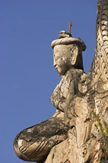 Figure on one of the ancient stupas, Kakku Buddhist Ruins, a site of over two thousand brick