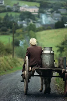 One Man Only Prints: Figure riding cart with milk churn