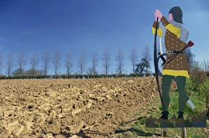 Warfare Prints: Figure on a sign marks the site of the Battle of Agincourt, in the Nord Pas de Calais