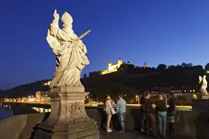 Franconia Prints: Figure of the St. Kilian, Baroque sculpture on the Old Bridge over Main River (Alte Mainbruecke)