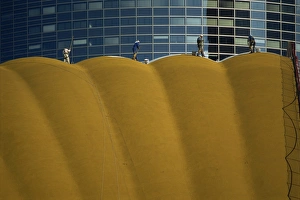 La Defense Prints: Figures cleaning the exterior of a modern office building, La Defense, Paris