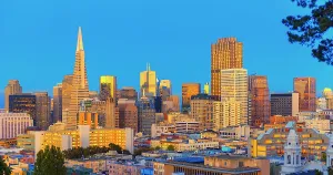Center Prints: Financial district skyline shows tall buildings and lights in San Francisco during evening hours in California