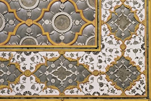 Detail of the fine mirror and plaster work found in the Sheesh Mahal