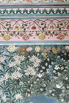 Detail of the finely painted walls in one of the bedroom suites