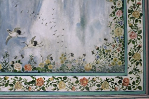 Detail of the finely painted walls in one of the bedroom suites