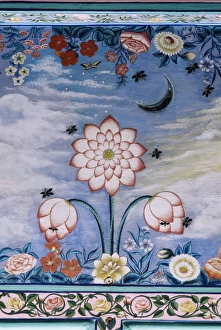 Detail of the finely painted walls in one of the bedroom suites