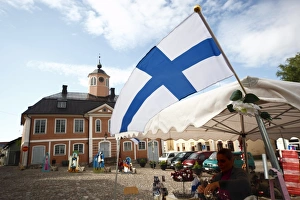 Flag Prints: Finnish flag and medieval Town Hall, Old Town Square, Porvoo, Uusimaa, Finland
