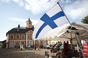 Images Dated 21st June 2009: Finnish flag and medieval Town Hall, Old Town Square, Porvoo, Uusimaa, Finland
