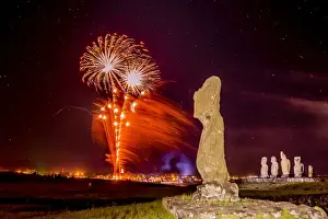 New Year Prints: Fireworks ring in the New Year from the town of Hanga Roa over moai in the Tahai Archaeological Zone on Easter Island