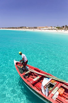 Fishermen Prints: Fisherman with his catch of fish in a traditional fishing boat, Santa Maria, Sal Island
