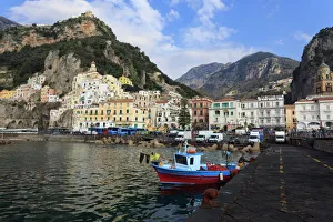 Fisherman Prints: Fisherman in fishing boat and Amalfi town, Costiera Amalfitana (Amalfi Coast), UNESCO