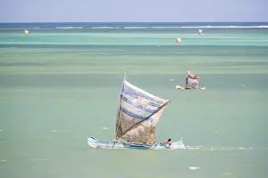 Fisherman Prints: Fisherman fishing from a Pirogue, a traditional Madagascar sailing boat, Ifaty, Madagascar