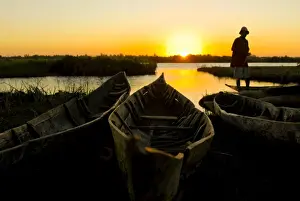 Repair Prints: Fisherman repairs his net at sunset, Canal des Pangalanes, Mankara, Madagascar