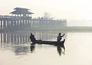 Rowing Prints: Fisherman on Taungthaman Lake in mist at dawn with U Bein Bridge