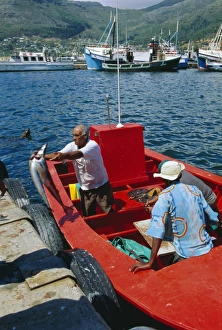 Lifting Prints: Fisherman unloading catch
