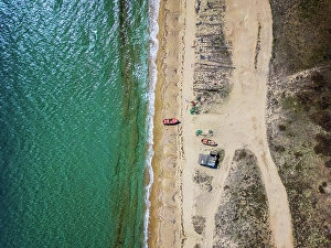 Fishermen Prints: Fishermen boats on a wild beach, drone aerial top view, Thessaloniki, Greece