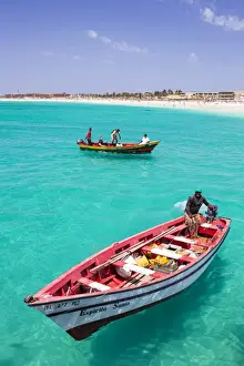 Fishermen Prints: Fishermen bringing their catch of fish in fishing boats to Santa Maria, Sal Island