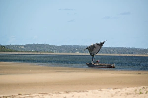 Mozambique Prints: Fishermen with dhow setting seine net, Flamingo Bay, Inhambane, Mozambique, Africa