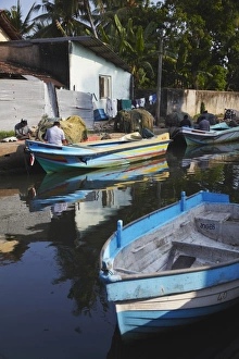 Fishing Nets Prints: Fishermen fixing nets along Hamilton Canal