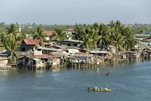 Fishermens stilt houses in wetlands at south end of Lingayen Gulf