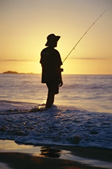 Fisherman Prints: Fishing from the beach at sunrise, Australia, Pacific