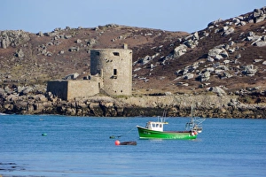 Tresco Prints: Fishing boat, Cromwells Castle on Tresco, Isles of Scilly, England, United Kingdom