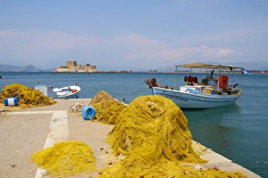 Fishing Net Prints: Fishing boat in harbour, Nafplion, Peloponnese, Greece, Europe