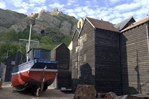 Images Dated 13th June 2009: Fishing boat and historic buildings with Hastings Castle in the background