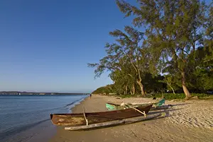 Wooden Boat Prints: Fishing boat lying on a beautiful beach near Diego Suarez (Antsiranana)