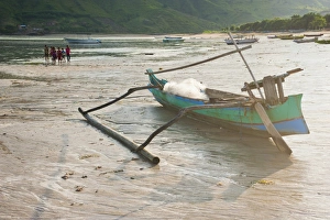 Kuta Beach Prints: Fishing boat lying on Kuta Beach, Kuta Lombok, Indonesia, Southeast Asia, Asia